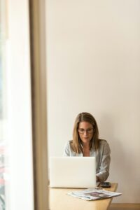 Woman using computer at home